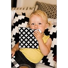 Little One playing with HYAKDesigns Crinkle Paper for Babies Swiss Cross