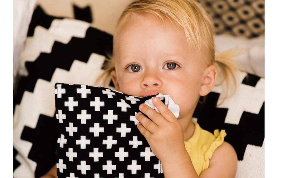 Little One playing with HYAKDesigns Crinkle Paper for Babies Swiss Cross