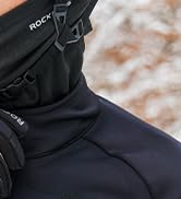 Close-up view of dark colored textile or clothing material against a marbled or textured background.