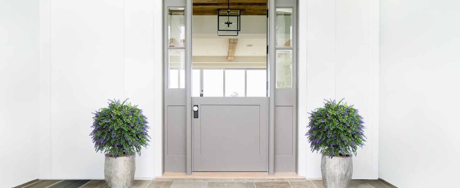 Text reads 'Image 1'. Modern minimalist office or commercial space interior with glass doors, potted plants on pedestals, and light-colored walls and flooring.