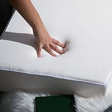 Hand touching DORMpillow