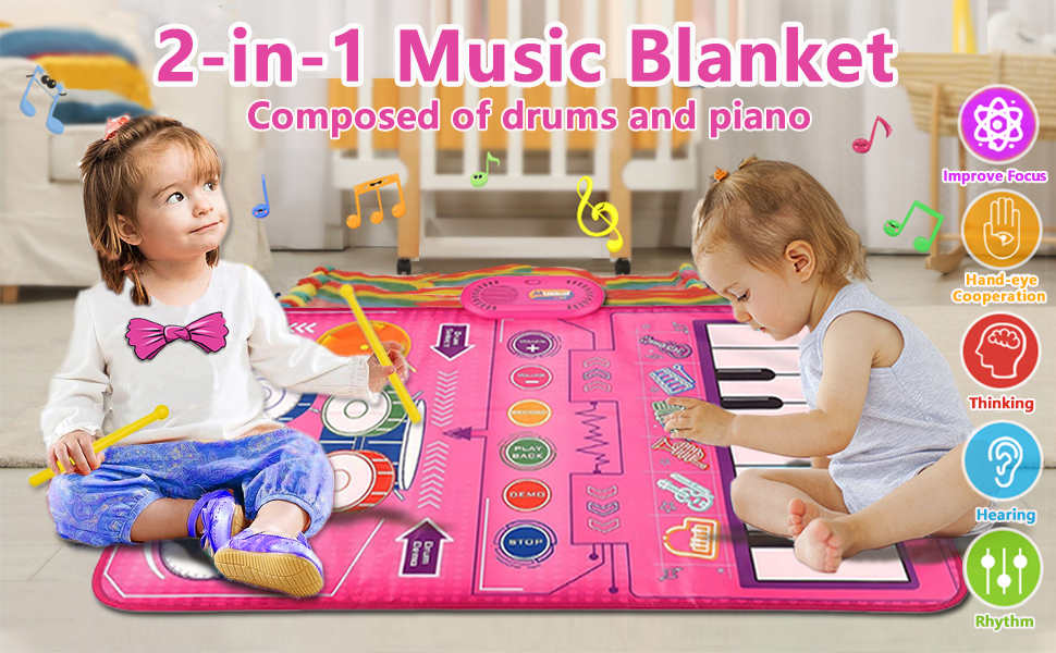 Pink musical play mat for children featuring piano keys and drum pads. Two young children shown playing on the interactive mat, with icons indicating various developmental benefits.