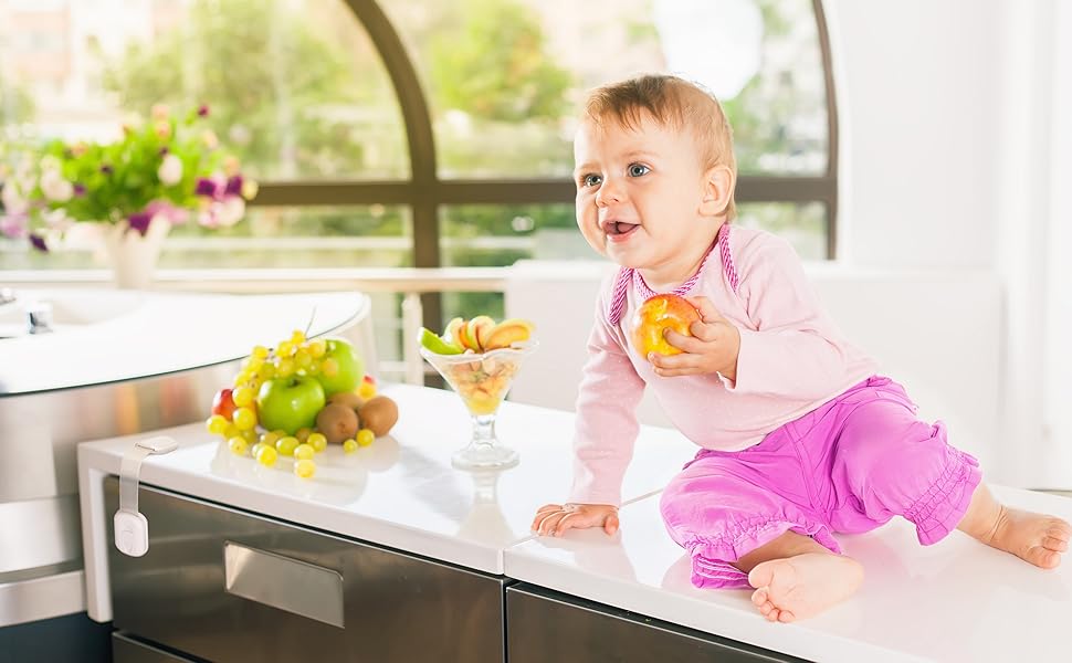 Child and Drawers secured by Baby Safety Locks