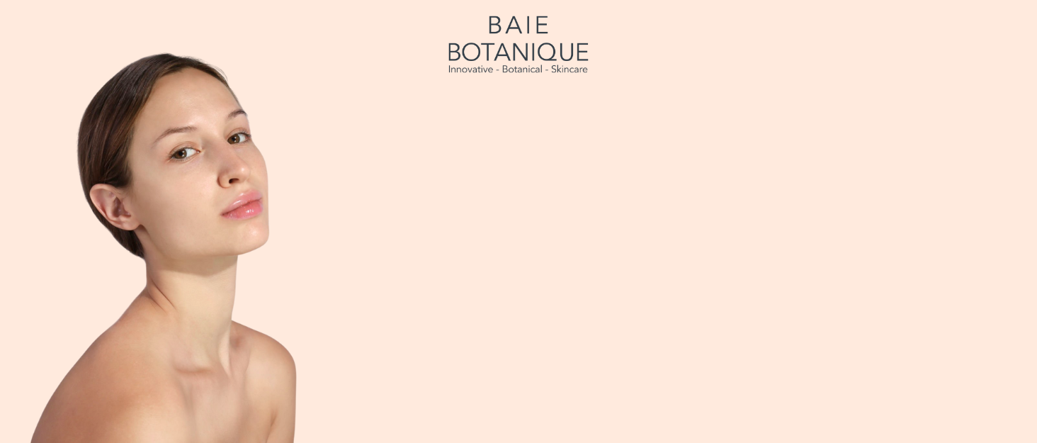 Cosmetic or skincare product advertisement featuring a peach-colored background with 'BAIE BOTANIQUE' text. Partial view of a woman's face and bare shoulders visible.