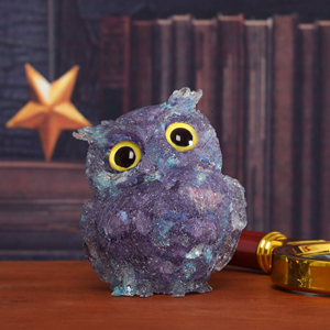 purple owl statue