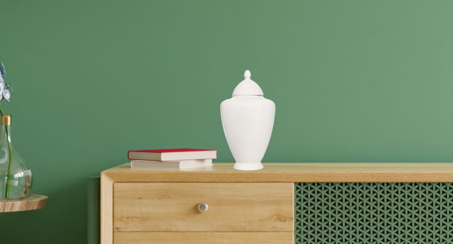 White Ceramic Ginger Jar on living room shelf