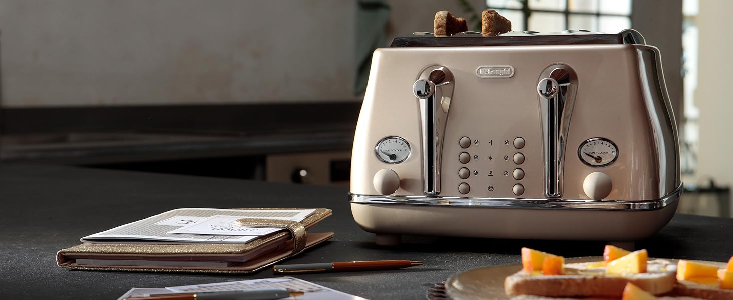 De'Longhi Icona Metallics CTOT4003. BG, 4 Slot Toaster with Reheat