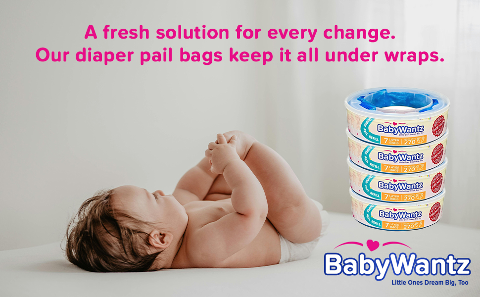 Baby laying with BabyWantz refills bags