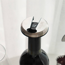 Vintorio Wine Foil Cutter on top of a red wine bottle