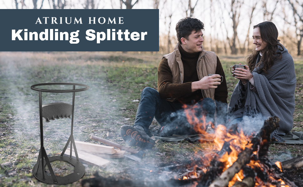 Couple sitting around a campfire showcasing the use of the kindling splitter.