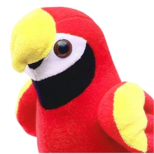 Close-up of plush parrot toy eyes and beak