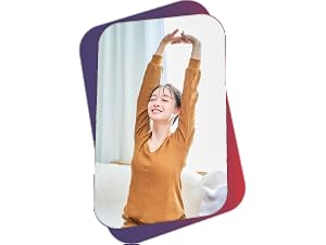 Woman stretching in bed