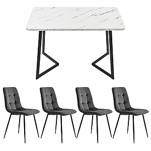 Modern dining set with white marble-look table and black metal legs. Four matching gray upholstered chairs with tufted design and black metal frames.