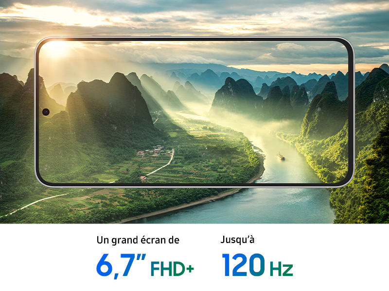 Le texte indique « 6,7 pouces FHD+ » et « 120 Hz ». Paysage panoramique de montagnes et de vallées avec des nuages ensoleillés au-dessus de l'eau.
