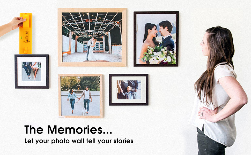 A woman reminisces about the bits and pieces of the past in front of a photo wall