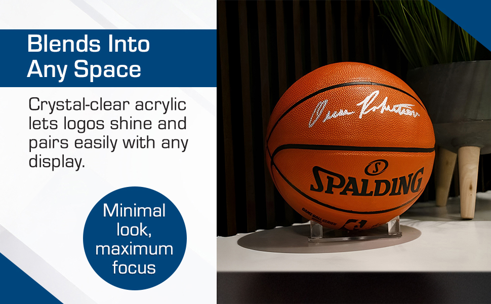 Acrylic ball stand displays signed basketball with a clear, minimal look.