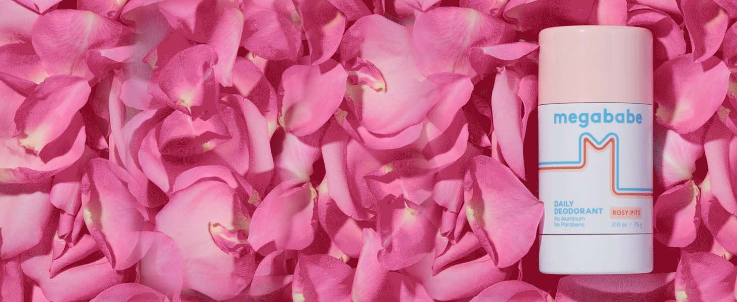 Rosy Pits on a background with rose petals.