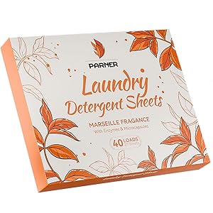 de sábanas de detergente para ropa Parner con fragancia a Marsella. Envase naranja y blanco con diseños de hojas. Contiene 40 cargas.
