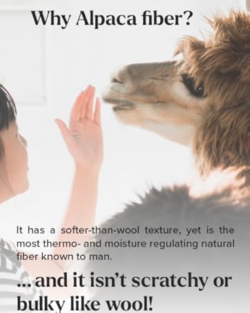 Women touching an alpaca