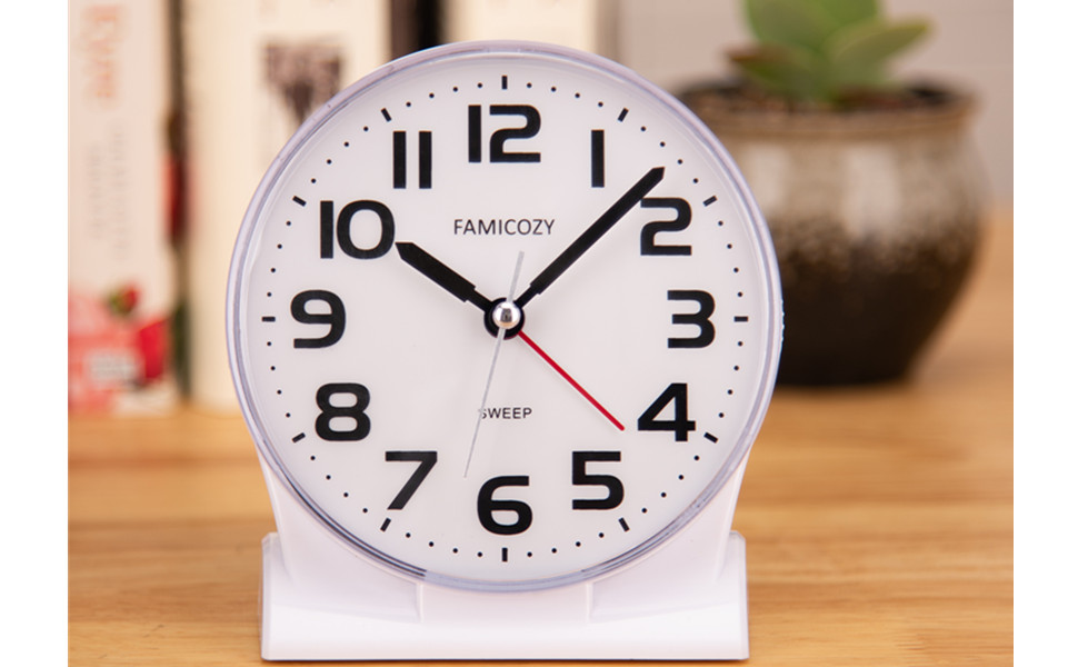 922 white clock face looking on table