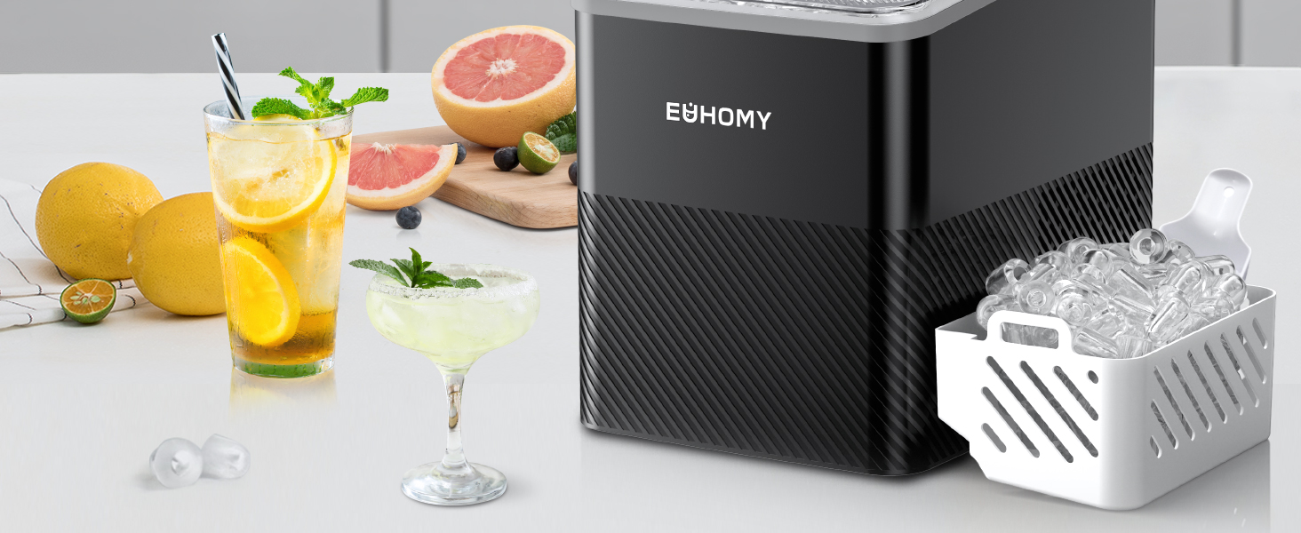 Black countertop ice maker shown with citrus fruits and beverages, featuring clear ice production capability