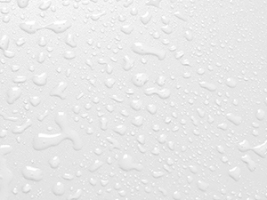 Der Text lautet „Bild 3“. Nahaufnahme einer strukturierten Oberfläche mit kleinen Wassertröpfchen oder Kondensation, wodurch ein Muster aus winzigen Perlen vor hellem Hintergrund entsteht.