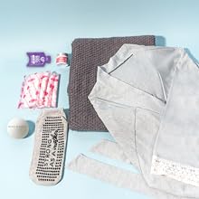 Comforting essentials for labor and delivery hospital bag, maternity robe, towel, nipple balm