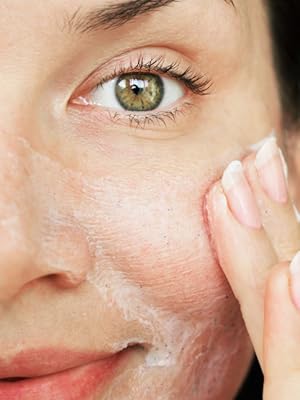 Woman using Microdermabrasion scrub