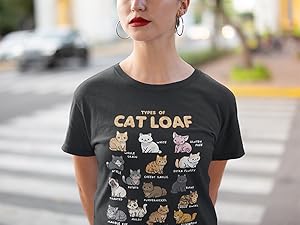 Woman wearing “Types of Cat Loaf” T-shirt featuring 15 cartoon cats with funny bread-themed names.