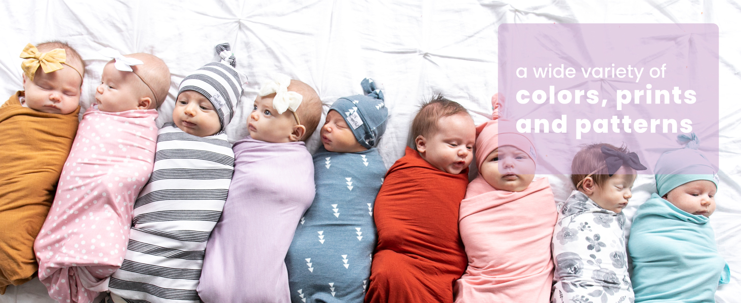 babies all different colors and print swaddles