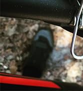 Dark automotive image showing reflection in vehicle surface at night.
