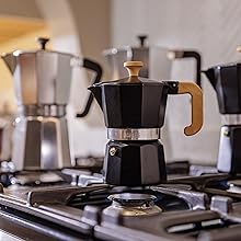 Lifestyle group image of the espresso makers on the hob