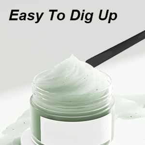Close-up of a light green cosmetic product in a glass jar. A black applicator is shown scooping the creamy substance. Text reads 'Easy To Dig Up'.