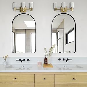 wall sconces over mirror