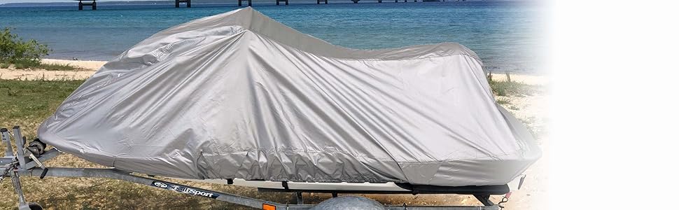 420 denier storage cover installed on a jet ski positioned on the sand near the Mackinac bridge