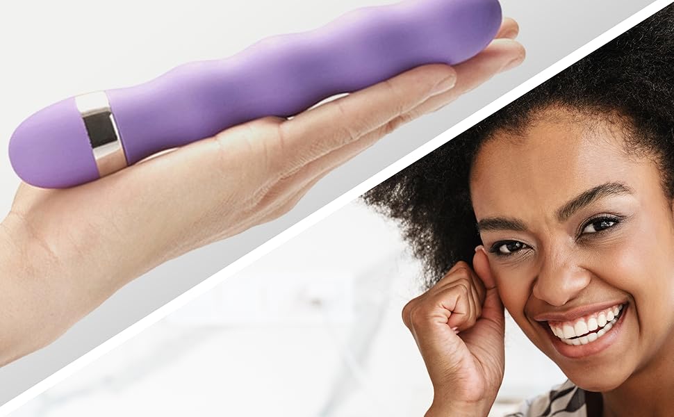 a woman holding a purple hand that has a purple wristband on it.