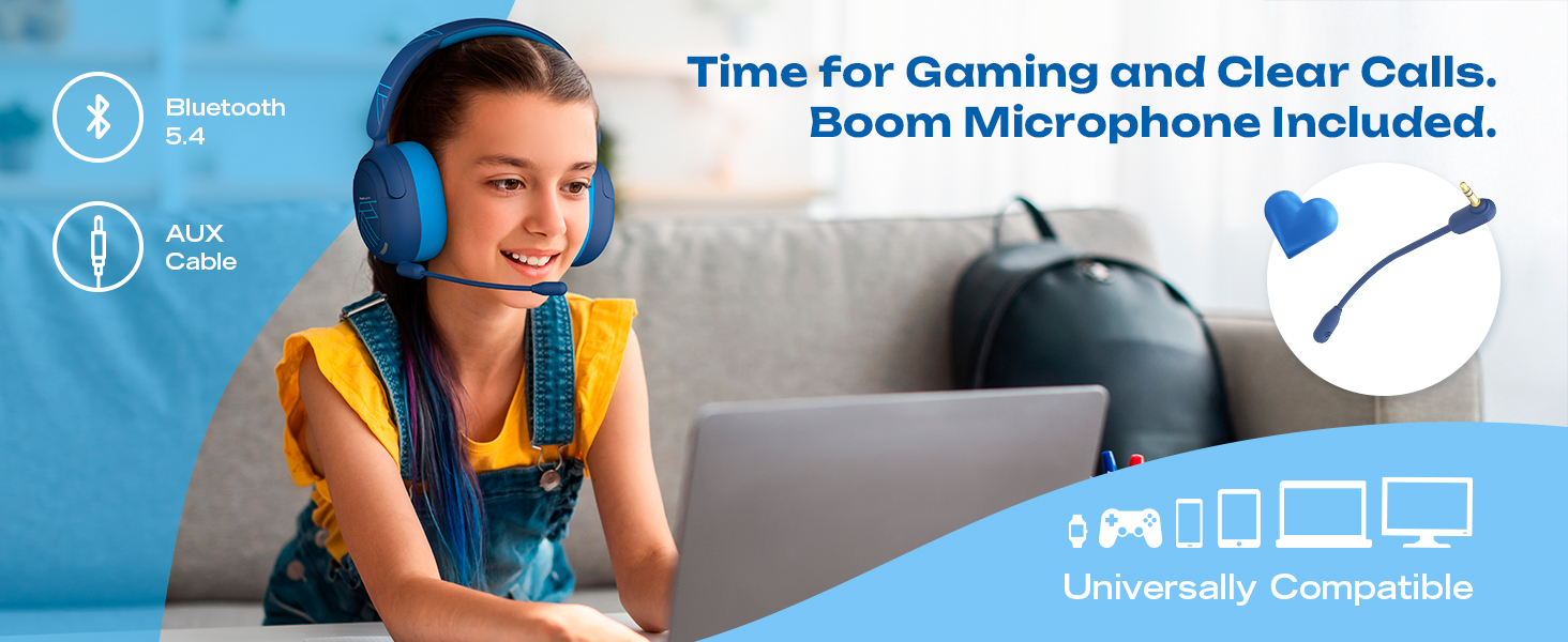 a young girl sitting on a couch with a laptop and headphones on.