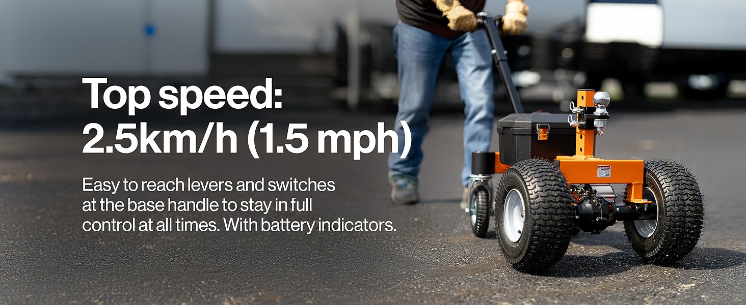 Text reads 'Top speed: 2.5km/h (1.5 mph)'. Orange motorized ride-on toy vehicle with large wheels shown on asphalt surface.