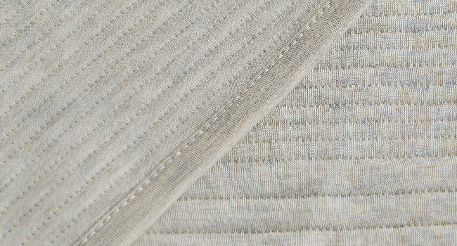 a close up of the quilt to show the fabric