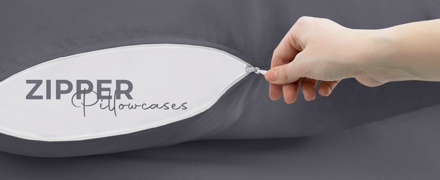 a hand inserting a zipper into a pillow cover.