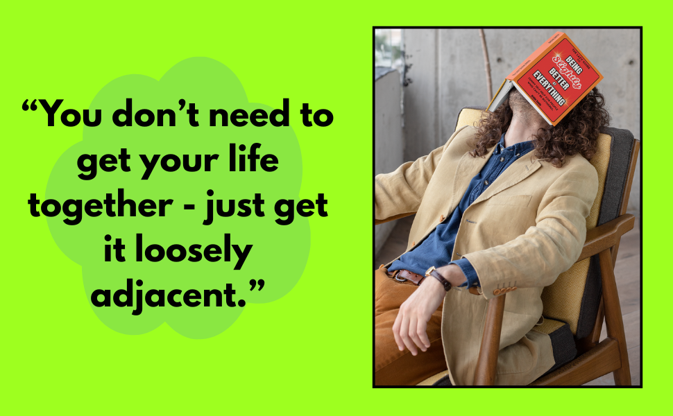 business man laying back in a chair with open book on his face