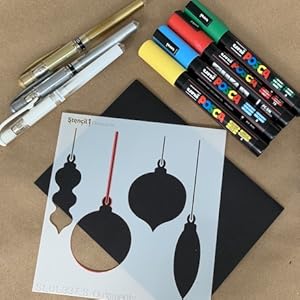 Holiday stencil with markers and pens