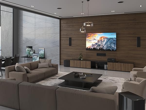 An RX-A8A AV receiver in a modern living room with surround sound speakers.