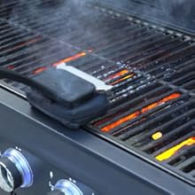 use bbq steam cleaner brushing grill