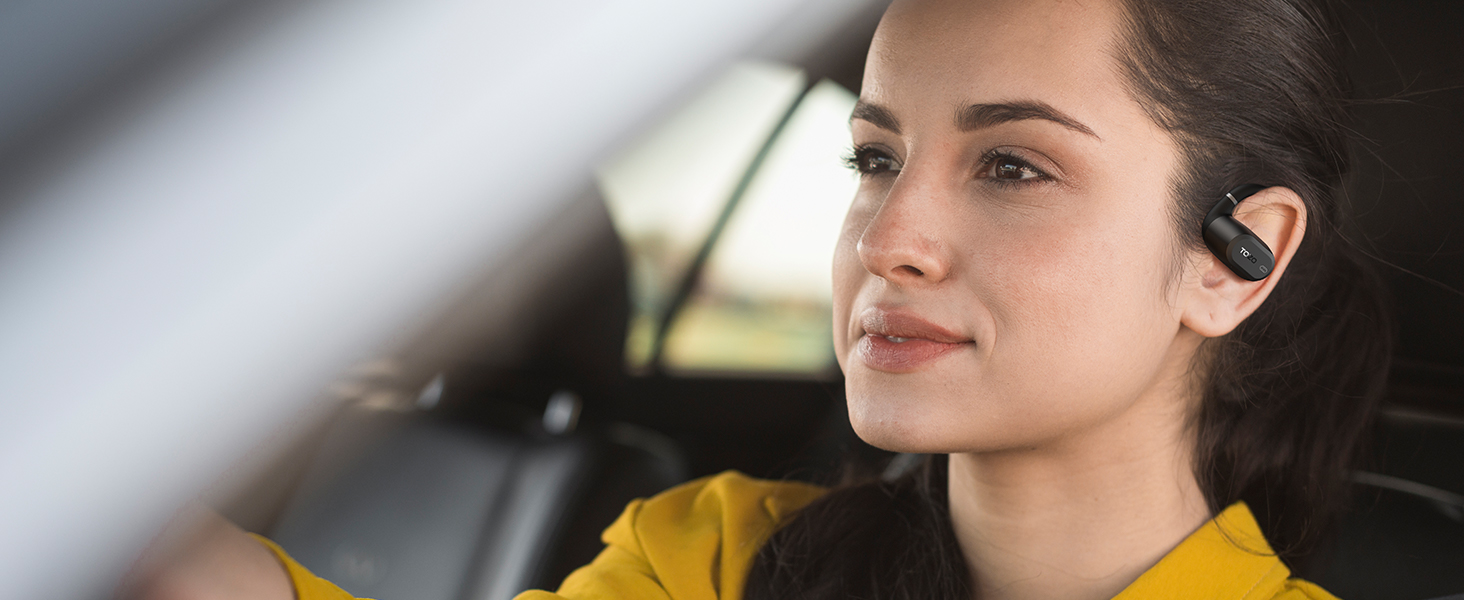 Product shots showing wireless earbuds being worn, with focus on fit and positioning in ear.