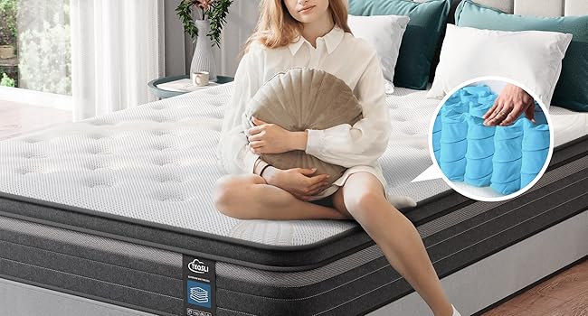 Mehrlagige Matratze, die in einem Schlafzimmer ausgestellt ist. Sie verfügt über verstärkte doppelte Federreihen und eine hervorgehobene Kühltechnologie mit blauer kreisförmiger Anzeige