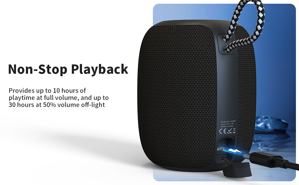 a speaker with a bluetooth speaker on the side.