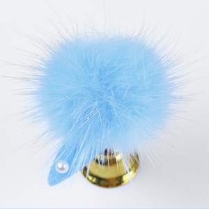 just stick the fur ball on it
