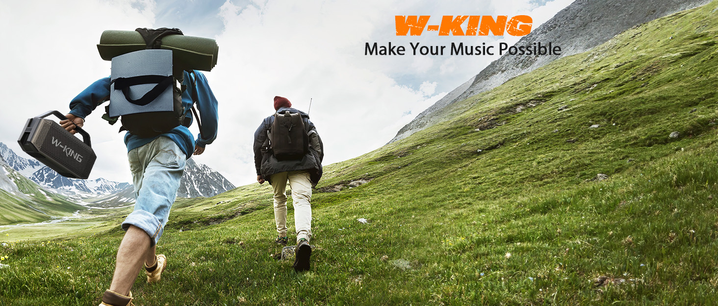 Outdoor hiking scene showing backpackers traversing a green mountain slope, with 'BY-KING Make Your Music Possible' text overlay in the upper portion.