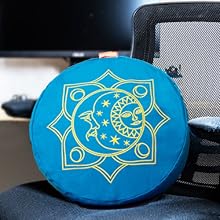 yoga meditation bolster round pillow cushion on top of an office